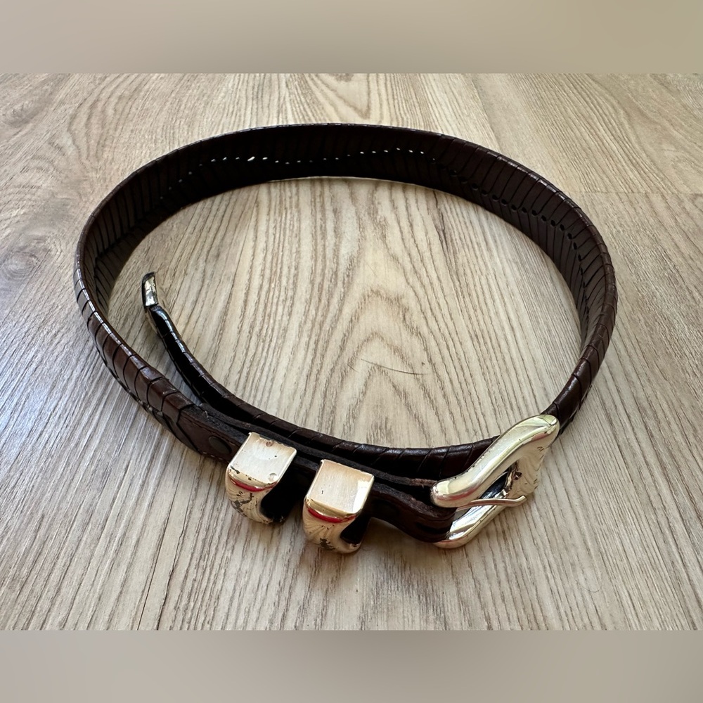 Brown leather belt with silver buckle, size 28